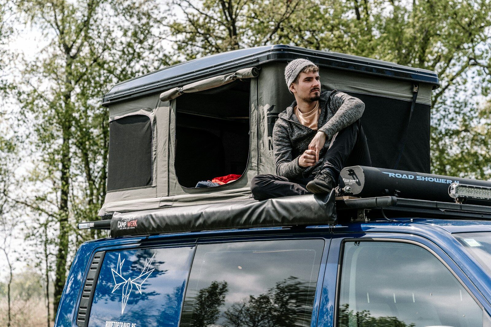 a man sitting in a vehicle